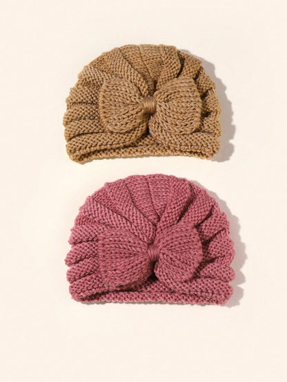 Prenda multicolor diadema tejida para bebe con lazo textura de punto
