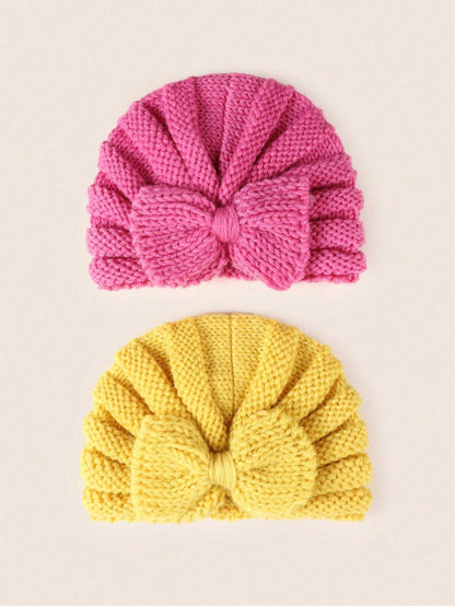 Prenda multicolor diadema tejida para bebe con detalle de lazo