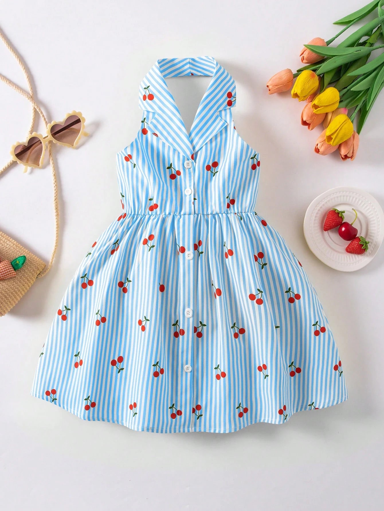 Prenda azul vestido para bebe rayado con cerezas vista frontal
