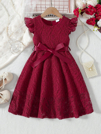 Prenda burdeos vestido de encaje para bebe vista frontal con lazo decorativo