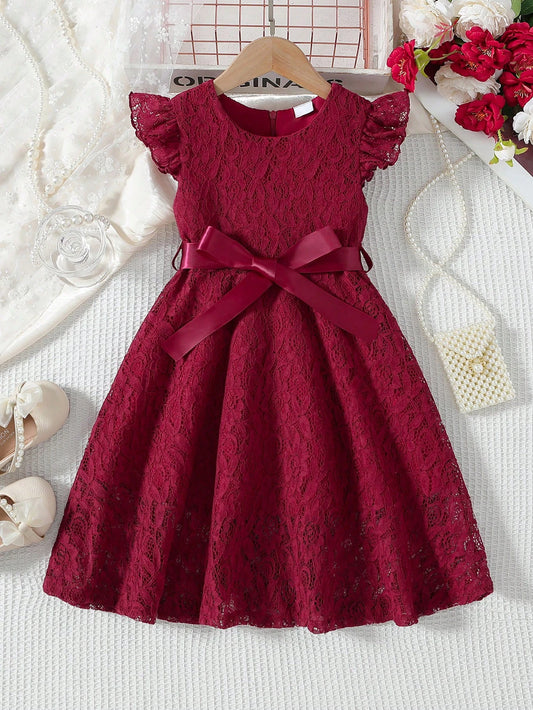 Prenda burdeos vestido de encaje para bebe vista frontal con lazo decorativo