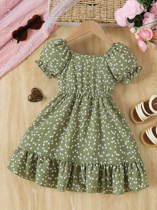 Prenda verde vestido para bebe con estampado de corazones vista trasera