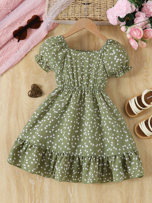 Prenda verde vestido para bebe con estampado de corazones vista frontal