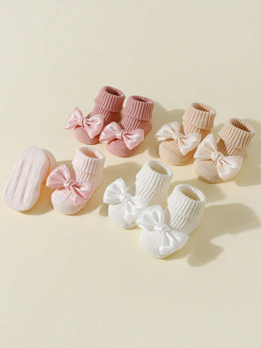Prenda multicolor calcetines para bebe con lazo diferentes colores
