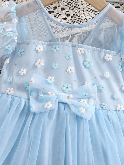 Prenda celeste vestido de tul para bebe detalle de lazo y flores bordadas