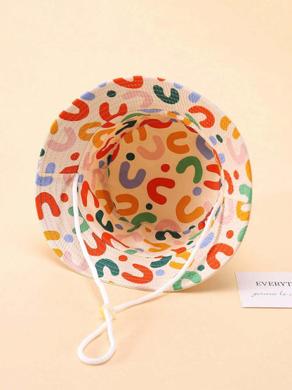 Prenda beige sombrero cubo para bebe reversible con estampado multicolor vista interior
