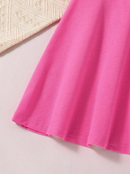 Prenda rosa fucsia vestido para bebe detalle del acabado inferior