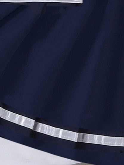 Prenda azul marino conjunto para bebe detalle de falda plisada y acabado inferior