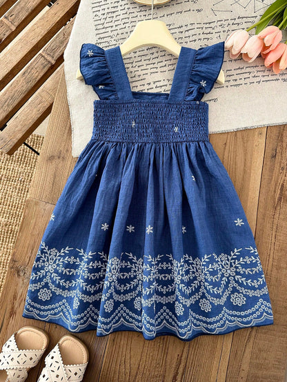 Prenda azul vestido para bebe vista trasera con cintura fruncida y tirantes