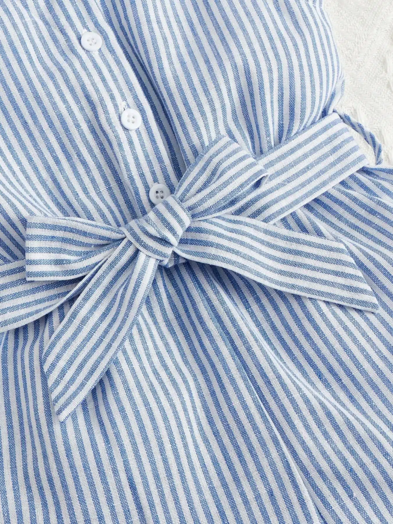 Enterizo de camisa azul y blanco con cinturón y volantes