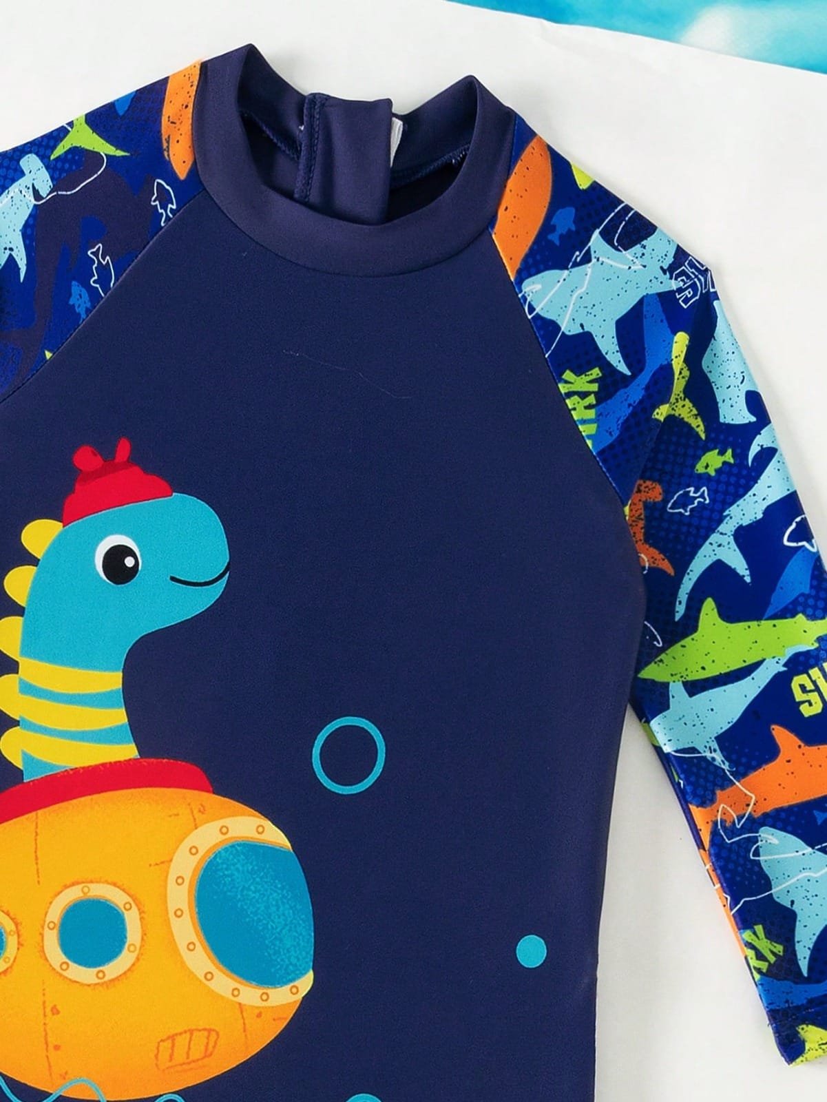 Traje de baño de dinosaurios para niños