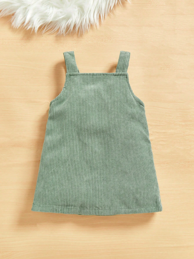 Vestido verde tipo overol con bordado floral bebé