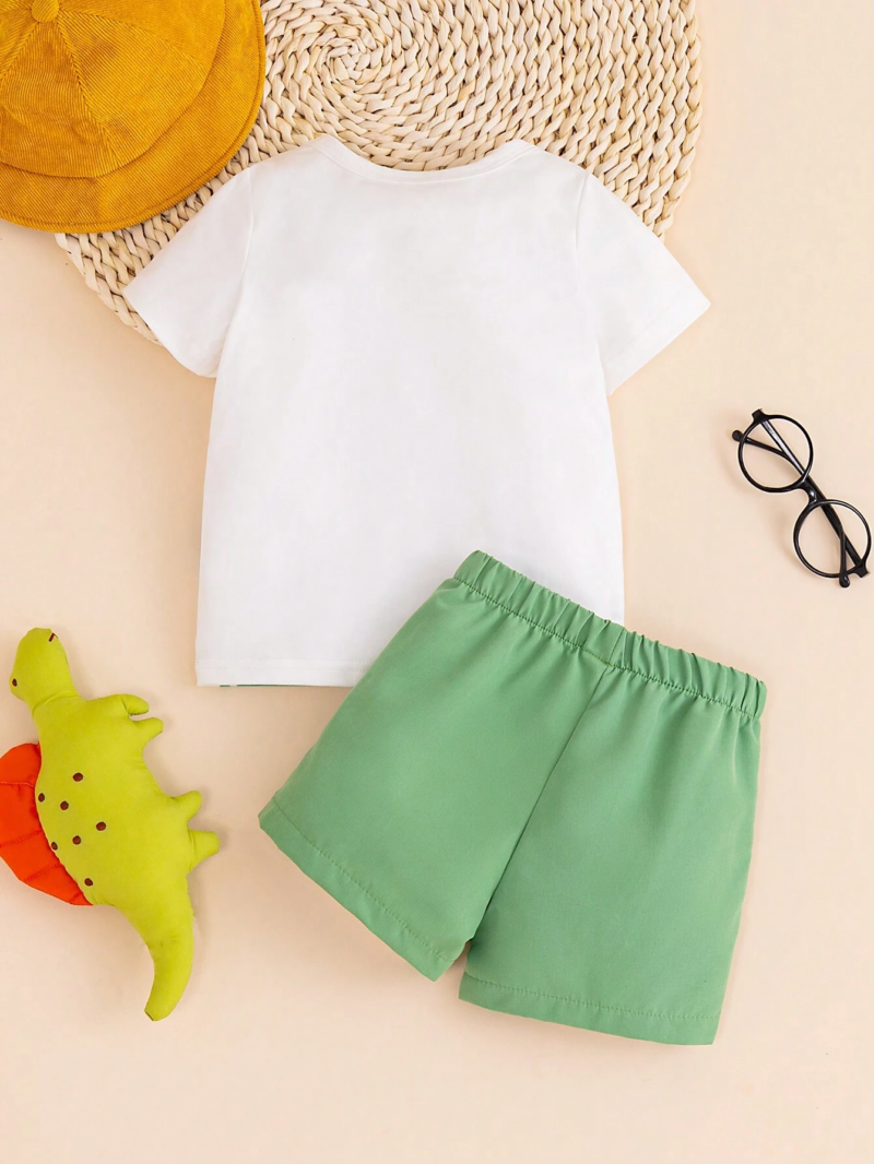 Conjunto amarillo con dinosaurio bebé niño divertido verano