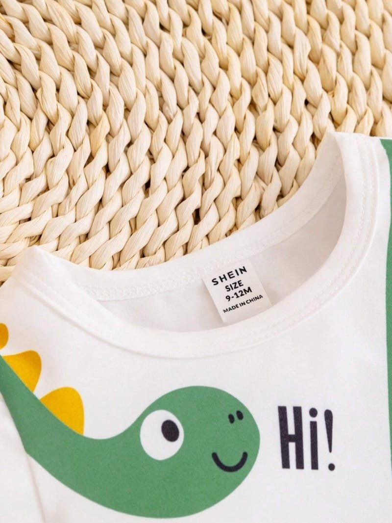 Conjunto amarillo con dinosaurio bebé niño divertido verano