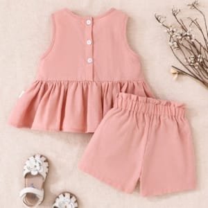 Conjunto rosa elegante con lazo para bebé niña