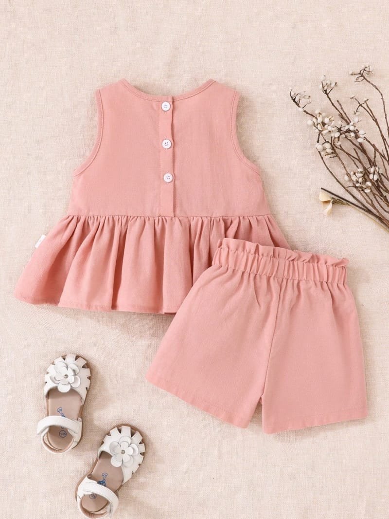 Conjunto rosa elegante con lazo para bebé niña