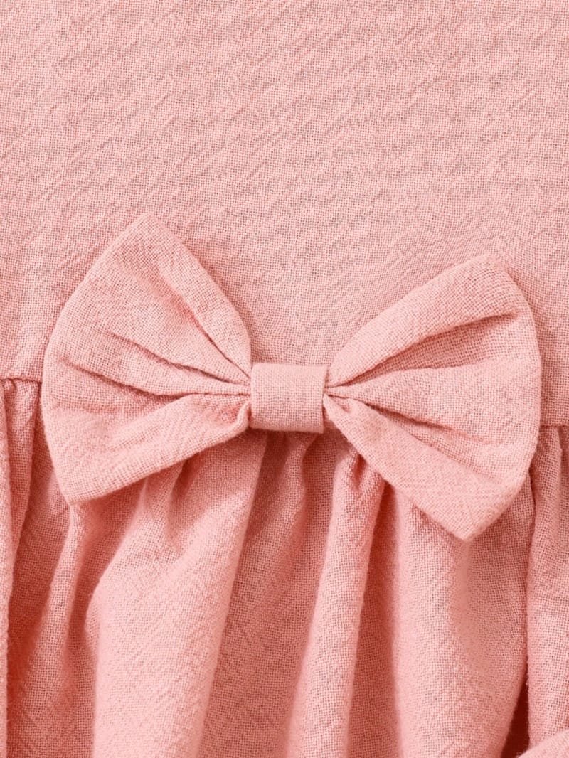 Conjunto rosa elegante con lazo para bebé niña