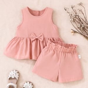 Conjunto rosa elegante con lazo para bebé niña