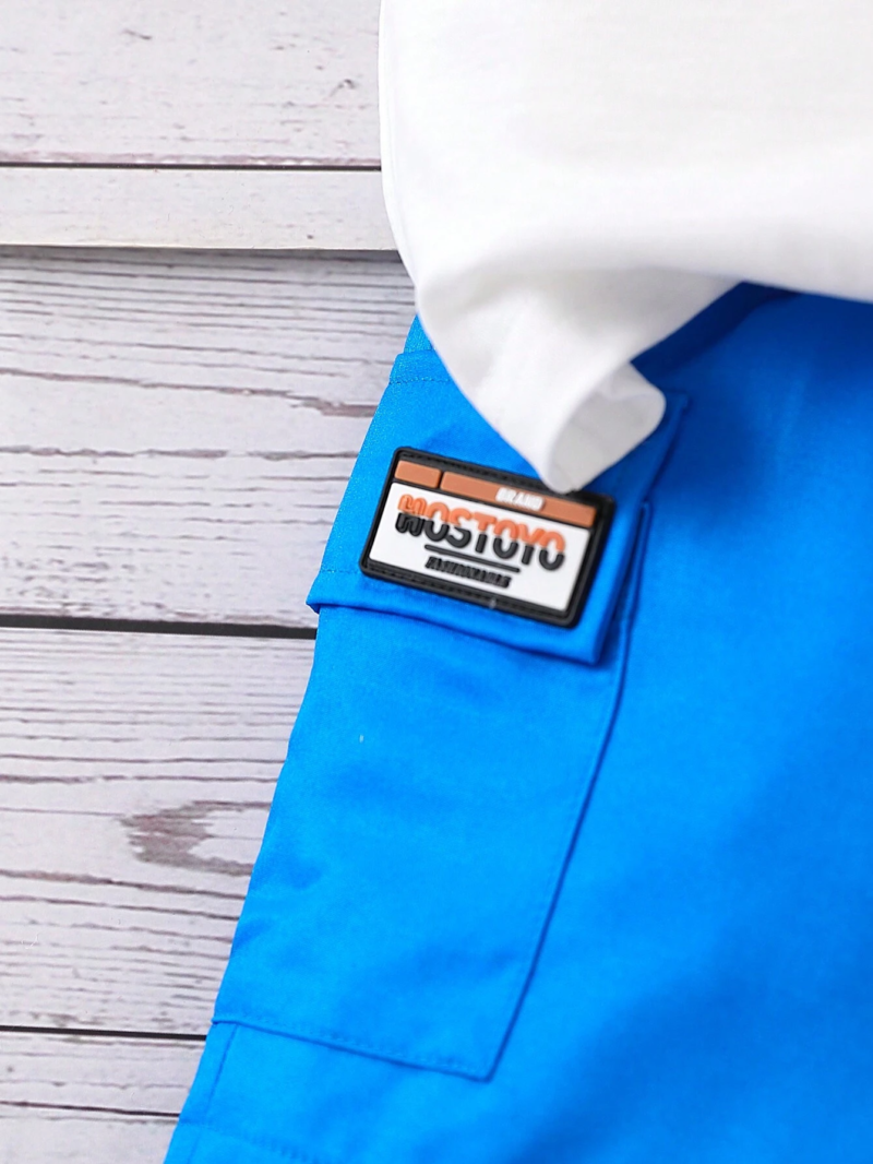 Conjunto blanco y azul con estampado de tiburón para bebé