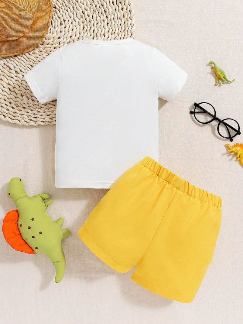 Conjunto amarillo con dinosaurio bebé niño divertido verano