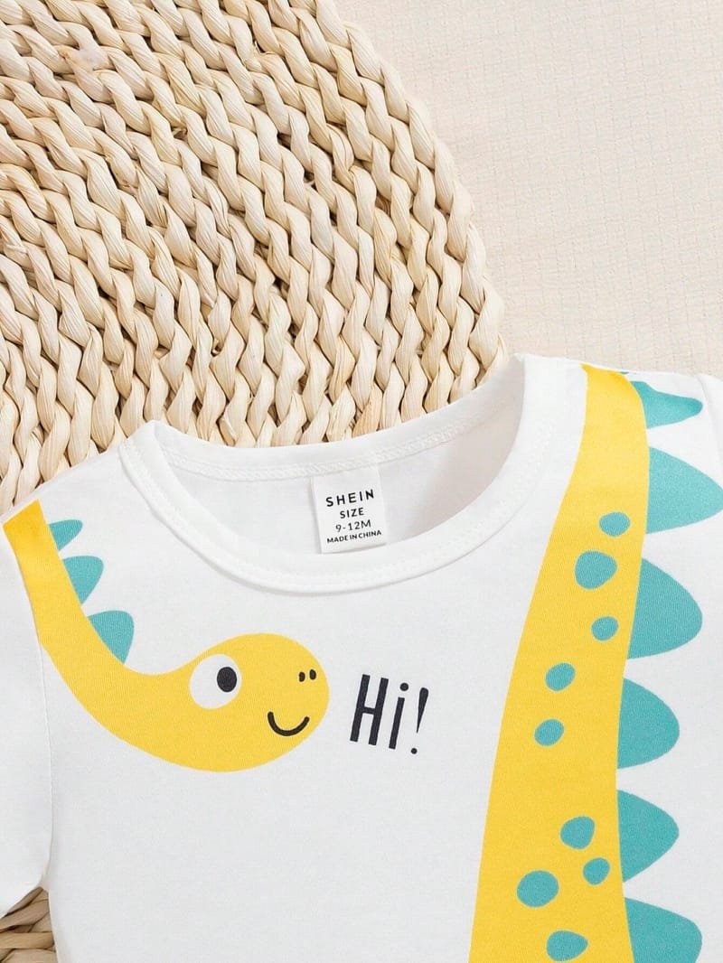 Conjunto amarillo con dinosaurio bebé niño divertido verano