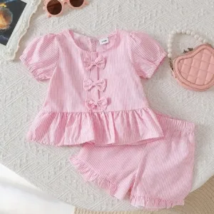 Set rosa con moños y shorts con volantes