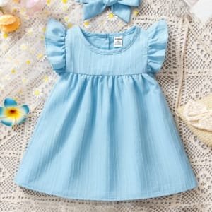 Vestido azul liso con diadema de moña