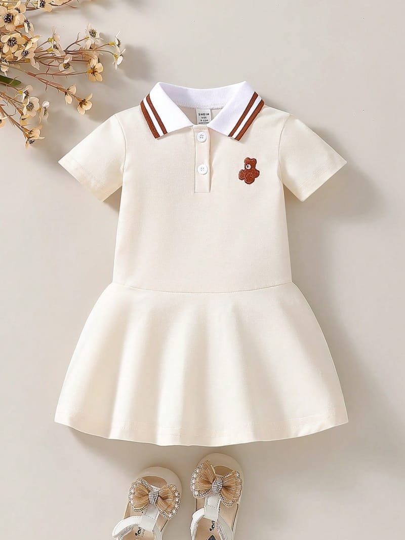 Vestido albaricoque con cuello polo y osito bordado