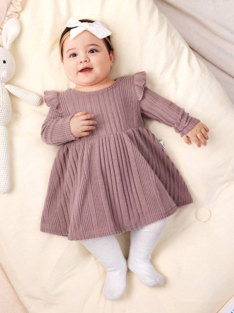 Vestido rosa de punto con mangas largas