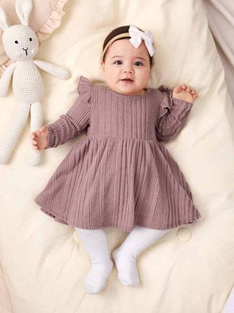 Vestido rosa de punto con mangas largas
