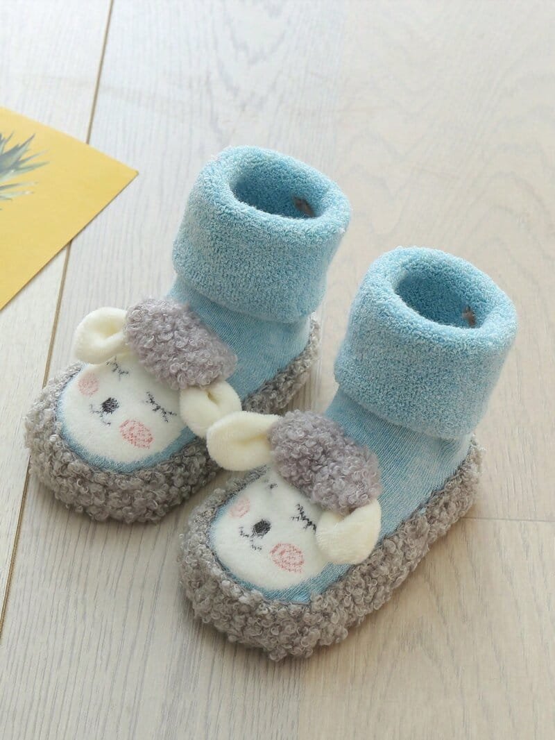 Calcetines antideslizantes azul con ovejita de peluche