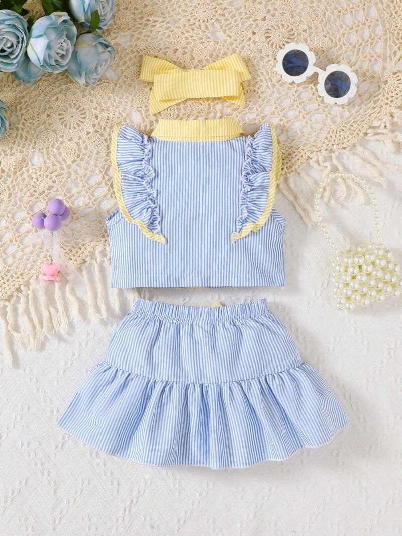 Set azul y amarillo con moño para niña bebé
