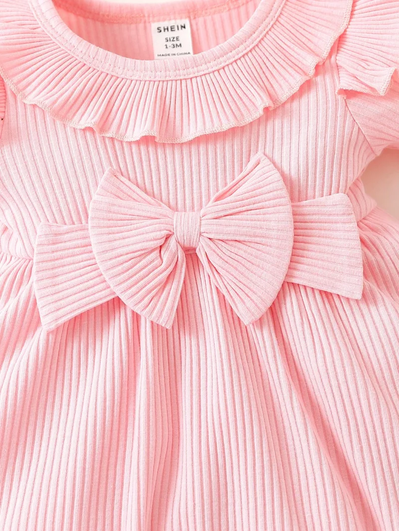 Vestido rosa dulce con moño y volantes para bebé