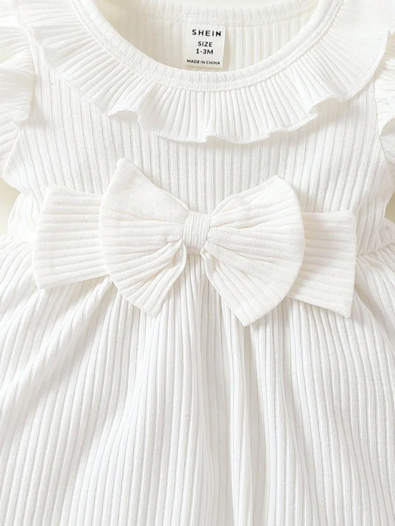 Vestido Blanco dulce con moño y volantes para bebé
