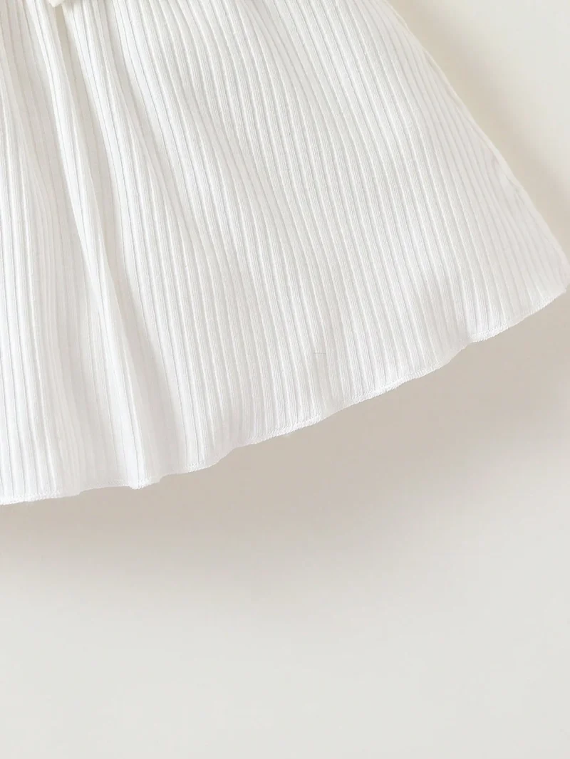 Vestido Blanco dulce con moño y volantes para bebé