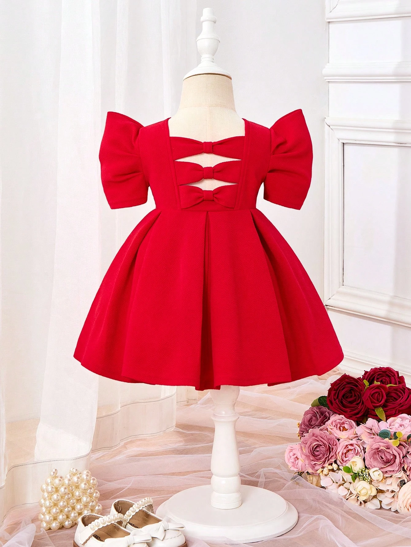 Vestido rojo manga corta con moño elegante