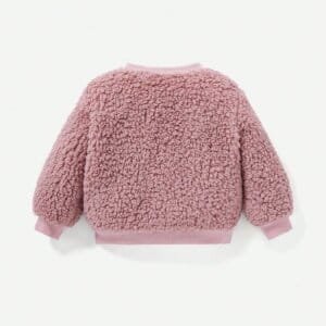 Conjunto rosa bebé peluche con diseño bordado y orejas 3D