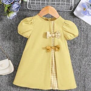 Vestido amarillo con lazos y manga farol