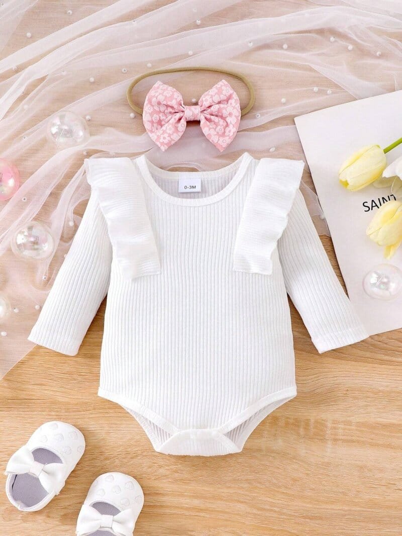 Conjunto blanco y rosa para bebé niña con falda floral