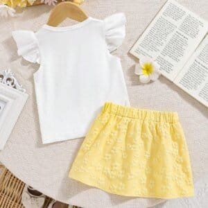 Conjunto blanco y amarillo para bebé niña con falda floral