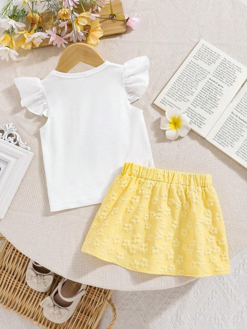 Conjunto blanco y amarillo para bebé niña con falda floral