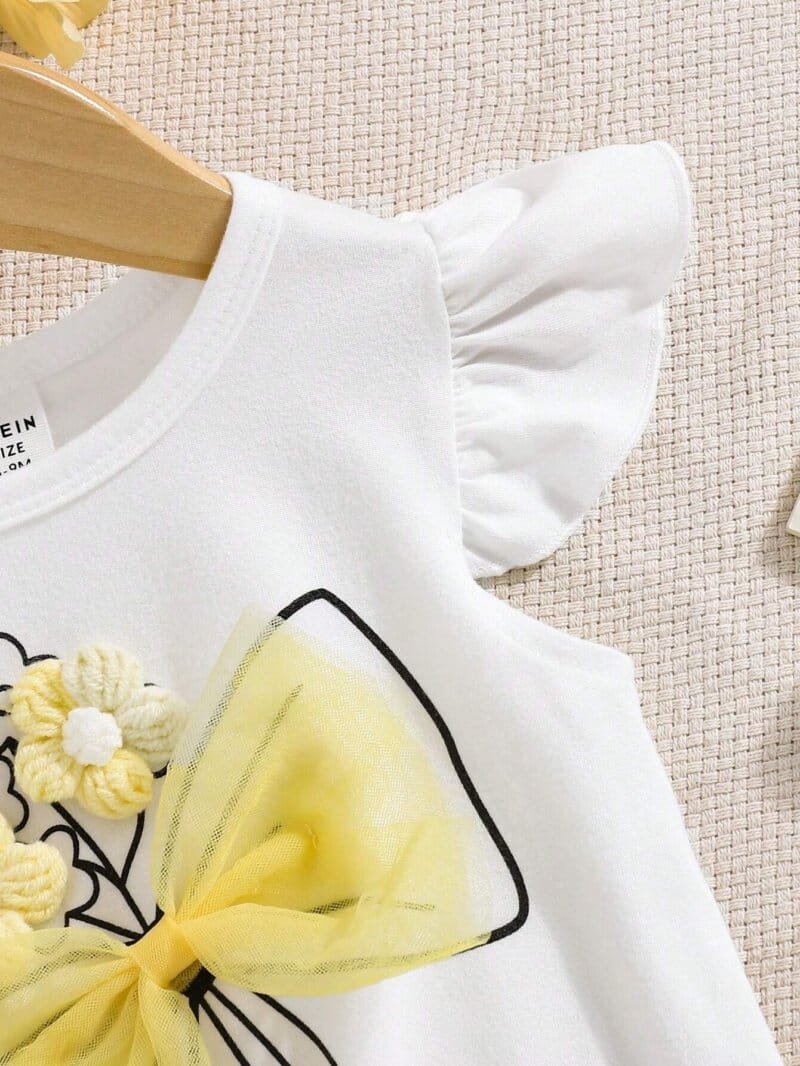 Conjunto blanco y amarillo para bebé niña con falda floral