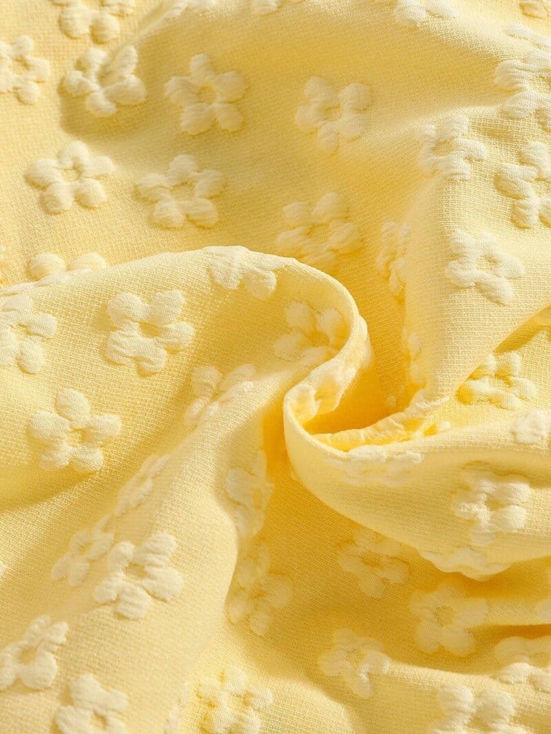Conjunto blanco y amarillo para bebé niña con falda floral