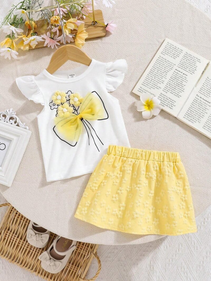 Conjunto blanco y amarillo para bebé niña con falda floral