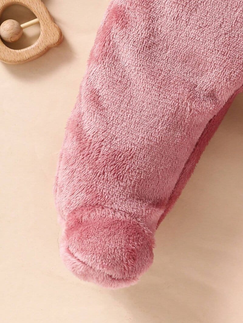 Pijama rosa bebé niña con capucha orejas de conejo