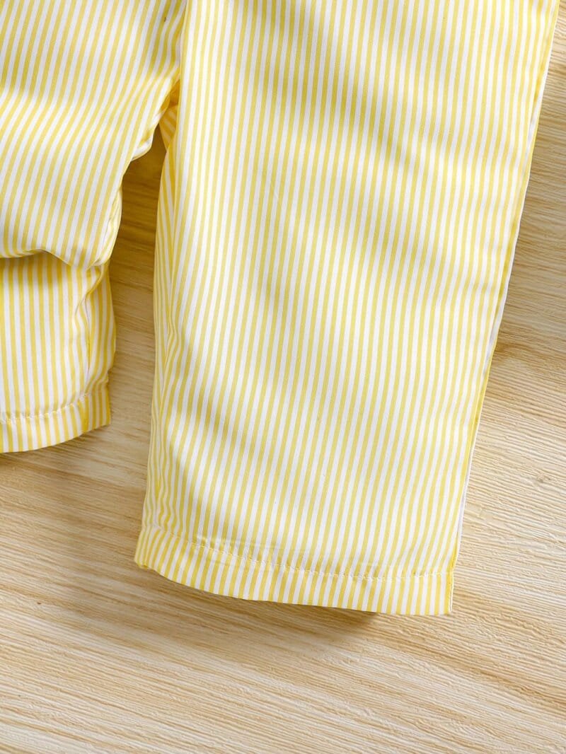 Mono amarillo de rayas con volantes y lazo frontal