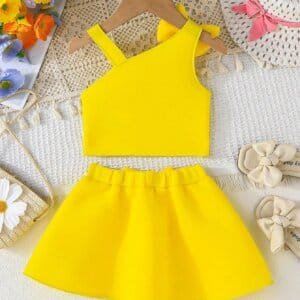 Set amarillo bebé niña con top de tirantes y falda con moño