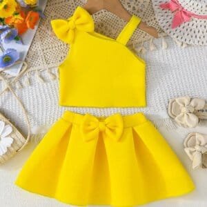 Set amarillo bebé niña con top de tirantes y falda con moño