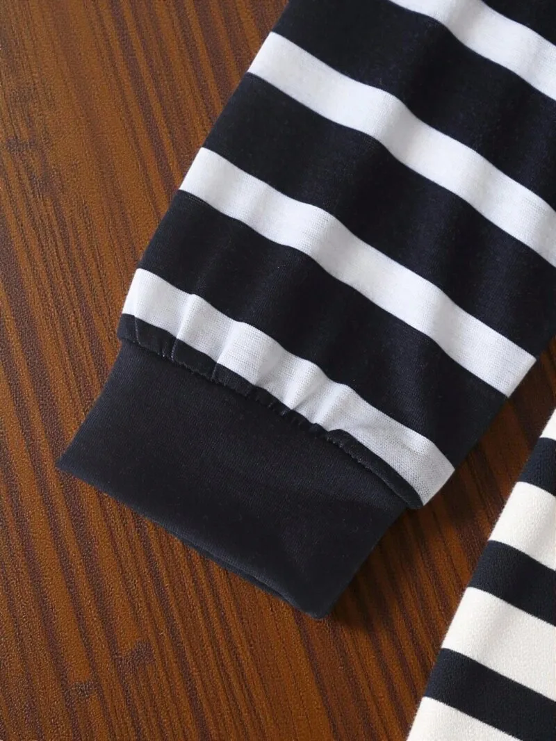 Conjunto negro para bebé niño con rayas y pantalón casual