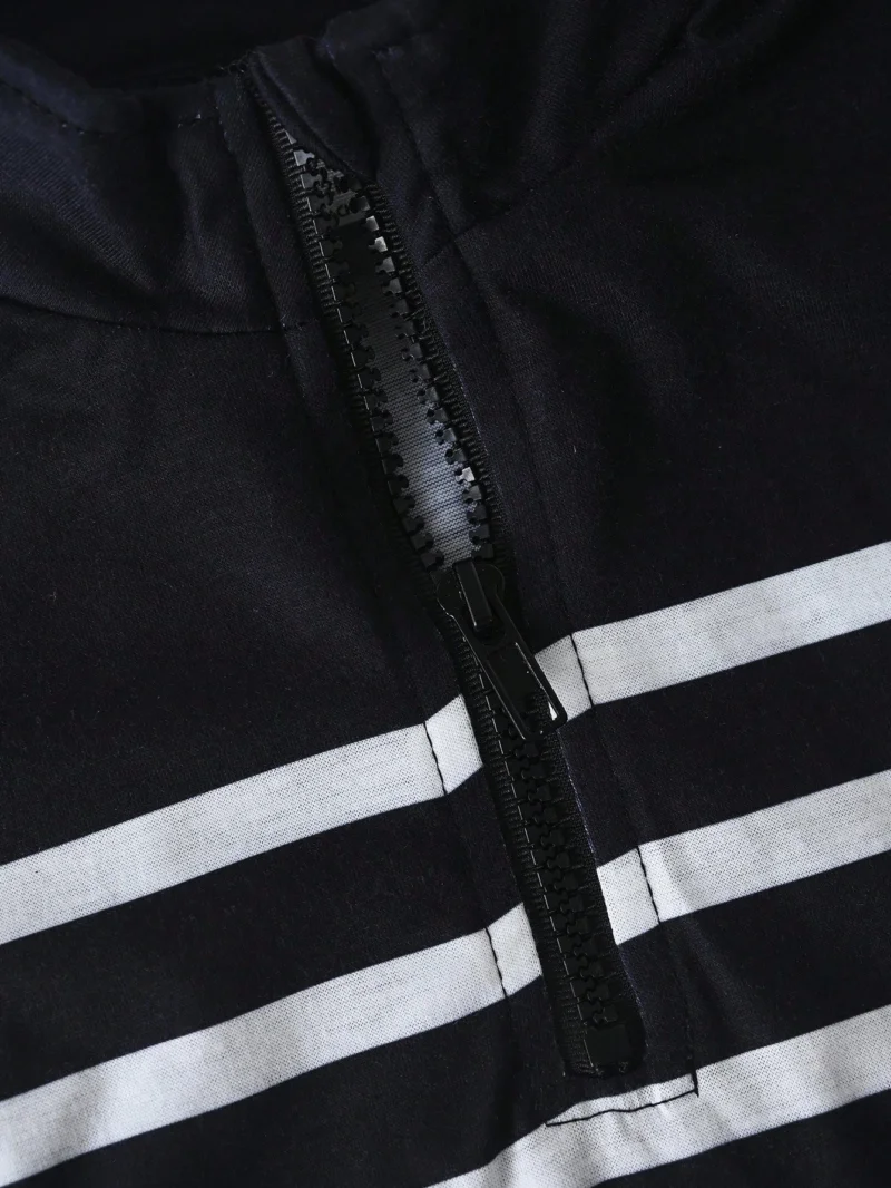 Conjunto negro para bebé niño con rayas y pantalón casual
